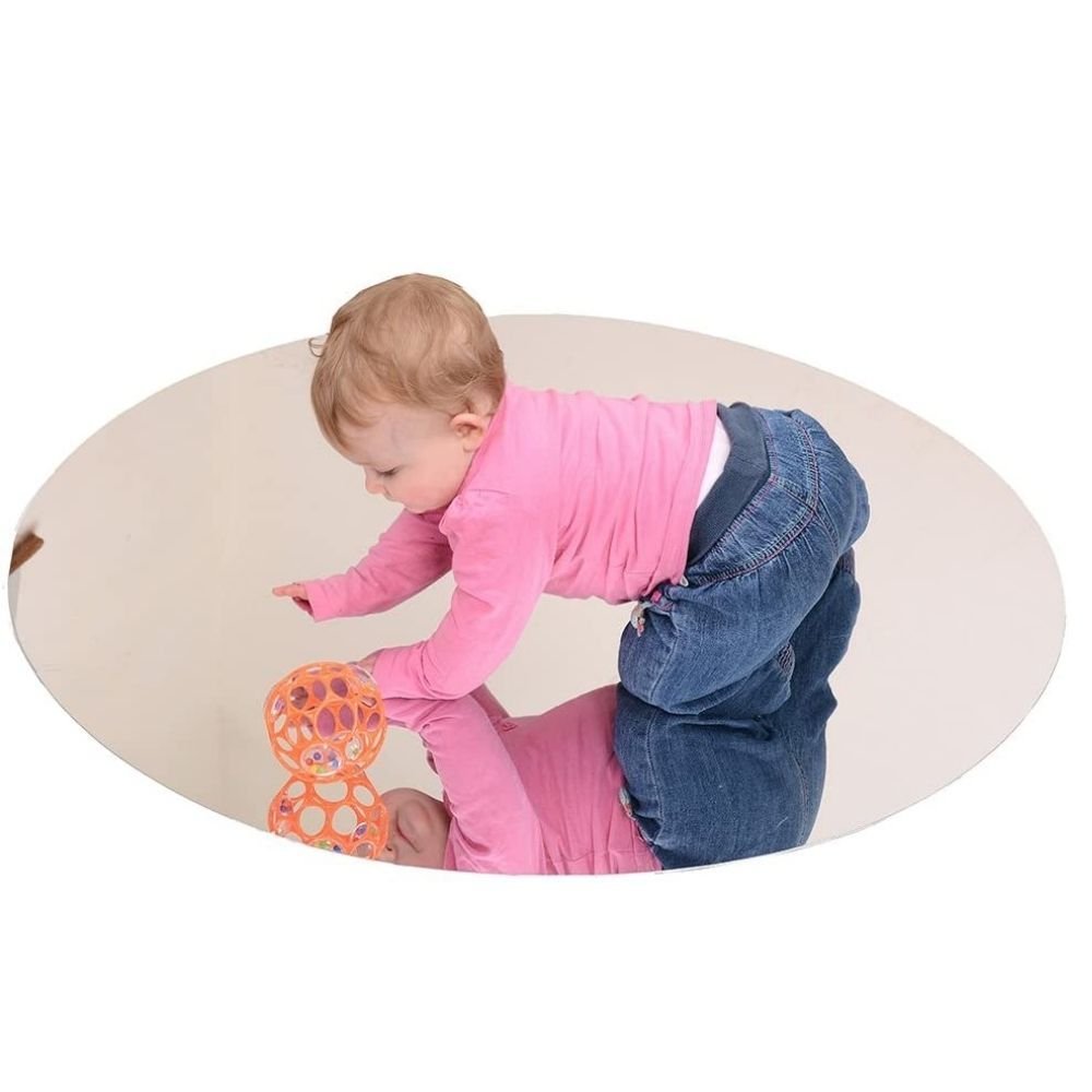 Round Visual Perception Mirror, Engage your little one's senses and curiosity with the Round Visual Perception Mirror, a large floor mirror specifically designed to foster a child's development from a young age. This multi-functional Round Visual Perception Mirror is more than just a reflective surface; it's a tool for enhancing visual tracking, hand-eye coordination, and sensory engagement. Round Visual Perception Mirror Features: Safe Interaction: Designed with safety in mind, the mirror offers a secure s