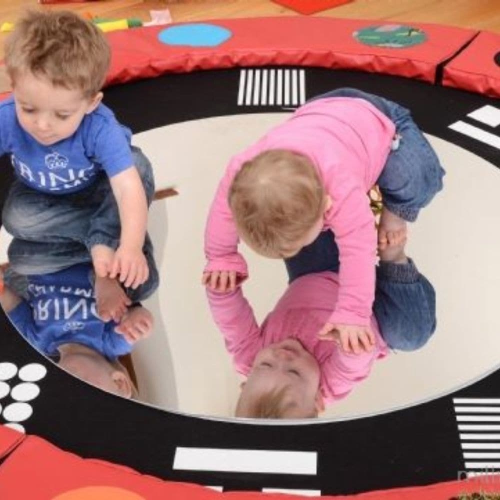 Round Visual Perception Mirror, Engage your little one's senses and curiosity with the Round Visual Perception Mirror, a large floor mirror specifically designed to foster a child's development from a young age. This multi-functional Round Visual Perception Mirror is more than just a reflective surface; it's a tool for enhancing visual tracking, hand-eye coordination, and sensory engagement. Round Visual Perception Mirror Features: Safe Interaction: Designed with safety in mind, the mirror offers a secure s