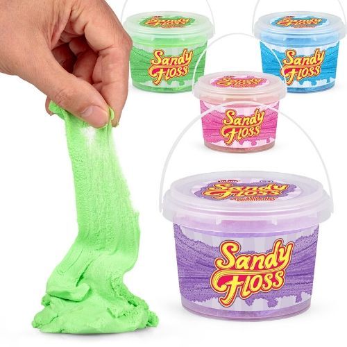 Sandy Floss, Sandy Floss is a Sand-like putty that become super stretchy and pliable as you handle it. Whilst it looks like sand initially, as you play with the putty it gels together and can be moulded into shapes or trickled between your hands with a waterfall effect. The Sandy Floss tub contains a very generous 300g helping of Sandy Floss putty too, ensuring there's plenty to go around. Available in four colours - pink, purple, blue and green. Large tub of sand-like putty Becomes stretchy and pliable as 