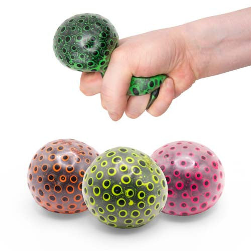 Scrunchems Neon Beans Squish Ball, Take a break from the hustle and bustle of daily life with the Scrunchems Neon Beans Squish Ball, the ultimate stress ball experience! This stress-relieving toy is not only squishy, but also delightfully stretchy, providing hours of fidgety fun and relaxation.Featuring a vibrant and dotty neon design, this groovy glob is visually captivating and instantly grabs your attention. Its brightly colored appearance adds a touch of excitement to your stress relief routine.The Scru