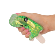 Green Scrunchems Sugar Ice Lolly being squeezed by hand