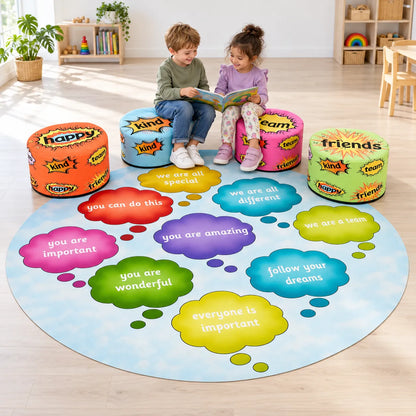 Two children sharing a book on the blue and pink positivity seats