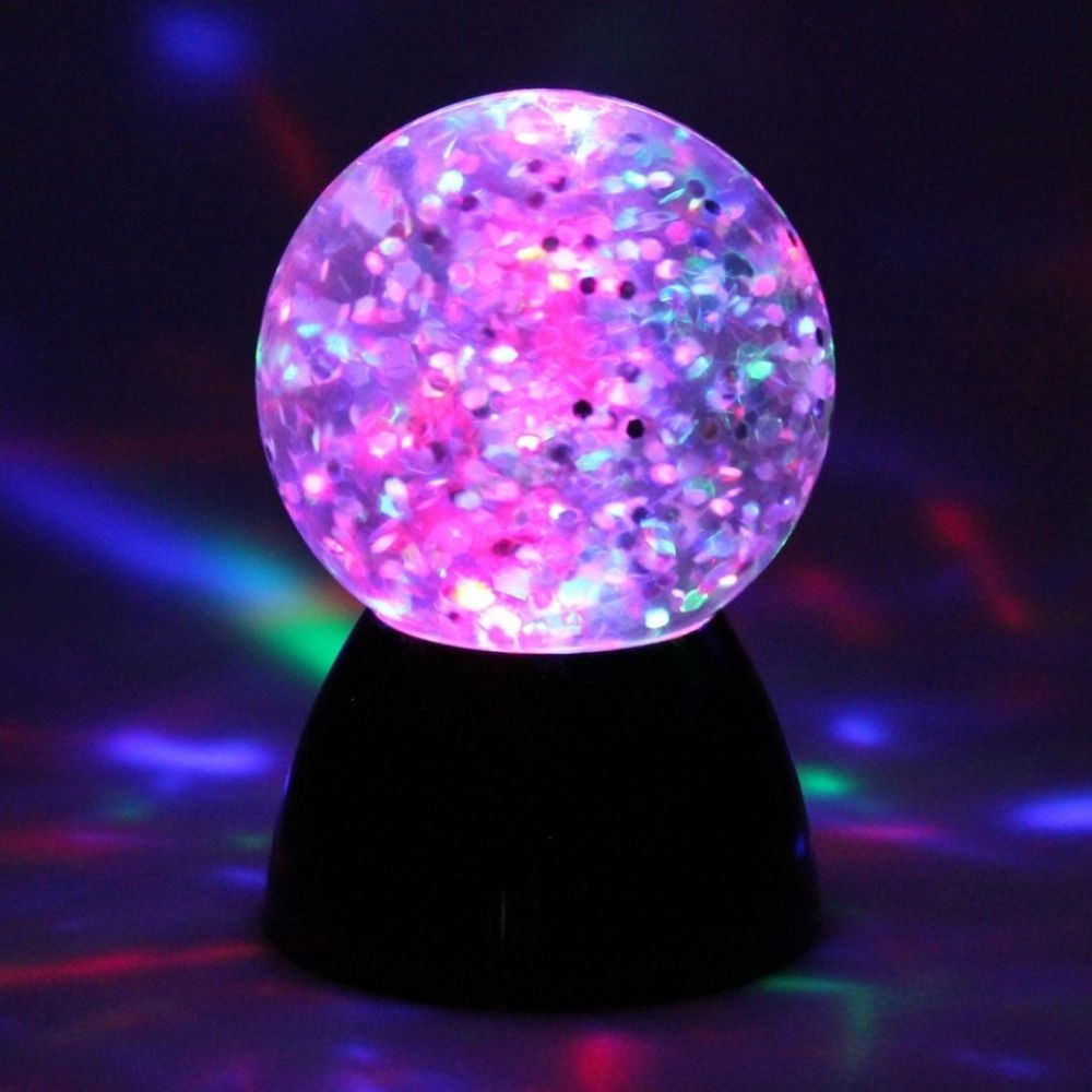 Sensory Glitter Waterball Lamp, Create a colourful storm of colour with our large and delightful and engaging Sensory Glitter Waterball Lamp measuring a whopping 13cm unlike the smaller ones sold by our rivals. The Sensory Glitter Waterball Lamp has a mixture of calming sensory lighting this small wonder of a light is bright and sure to attract attention and engage and entertain those who are lucky to own one. The Sensory Glitter Waterball Lamp makes a great addition to a bedside cabinet or cupboard making 