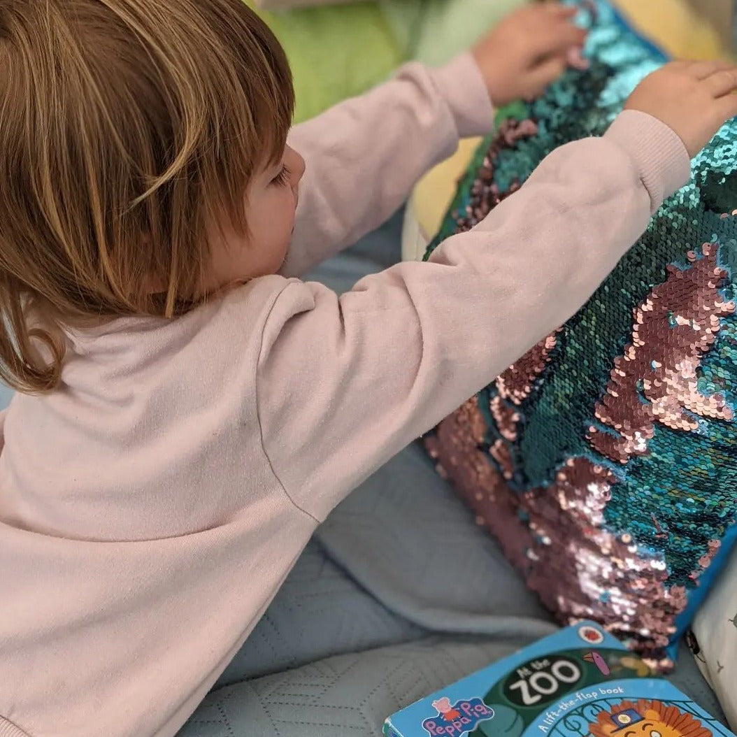 Sensory Mermaid Cushion, The sequin fabric looks like shimmery fish scales, providing visual and tactile appeal,run your fingers across the reversible sequins and watch the colours change. Reversible sequin colour changing cushion, very tactile product, great for sensory rooms, item consists of cushion case and cushion filler. Move your hands across the reversible sequins to change the colour. Draw shapes or write your name on the pillow Colours supplied at random, Sensory Mermaid Cushion,Sequin cushion,mer