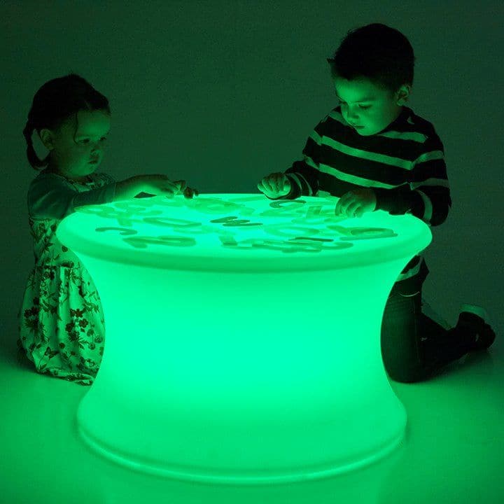 Sensory Mood Light Table, The ultra-strong illuminated Sensory Mood Light table is an aesthetically pleasing cotton reel shape, and can be placed around the room or used in a sensory den to provide a softly lit table unit. Using the Sensory Mood Light Table remote control you can choose one of 16 different colours or set to fade smoothly through the entire spectrum of shades from a cool ultra-violet to a warm red. The appearance of the Sensory Mood Light Table is mesmeric and the colour spreads evenly throu