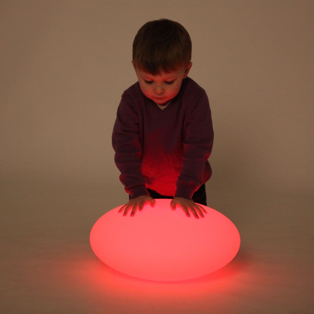 Sensory Mood Pebble, The TickiT® Sensory Mood Pebble is an ultra-strong and durable hollow pebble that your child can use in their bedroom or sensory area. It illuminates to create soft mood lighting, ideal as a night light or for creating a calm and captivating experience during sensory play.There are other shapes available in the Sensory Mood range including: ball, pyramid, egg, cube and a mood table and mood water table.Use the remote control to select one of 16 different colours for a constant soft glow