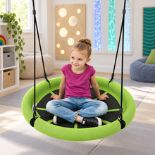 Green Sensory Nest Swing in a sensory playroom
