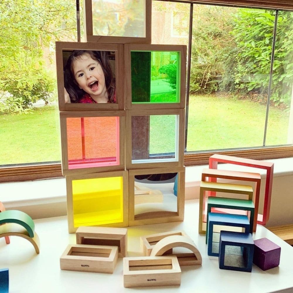 Sensory Squares 7pk, The Sensory Squares set is a beautiful wooden squares with different coloured and mirrored inserts to engage younger children. The Sensory Squares 7pk contains inserts which are red, yellow, green, blue, magnifier, mirror and concave/convex mirror. Children will love to handle the Sensory Squares. The Sensory Squares encourage observations and conversations about their different properties Practical Pre-School Awards 2017 "A beautifully made sensory toy which appeals to all ages. The bl