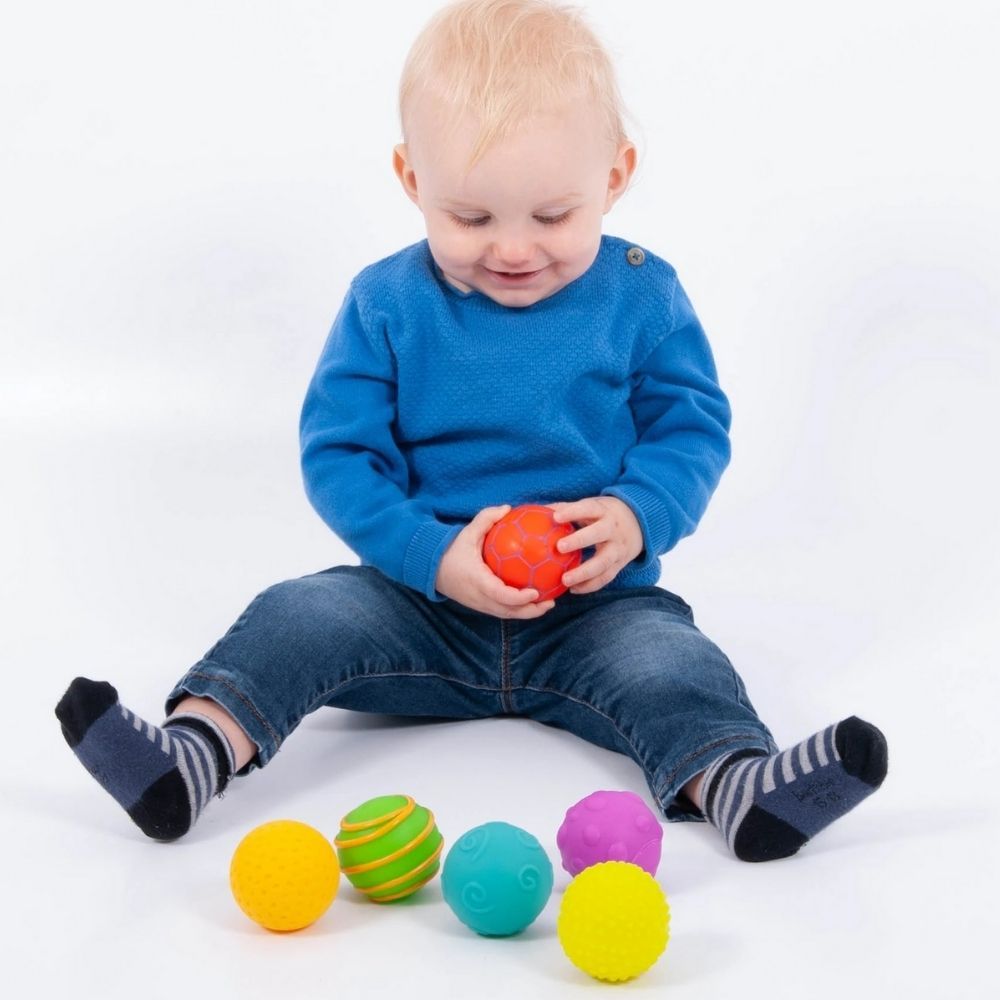 Sensory Texture Balls Pk6, Discover a World of Textures and Sensations with this Sensory Texture Balls set.Elevate your child's sensory experience with our pack of six differently textured balls. Perfectly crafted for little explorers over the age of 6 months, these balls are designed with an optimum size, making them a delightful fit for tiny hands. Why Choose Our Sensory Texture Ball Pack? Variety in Texture: Each ball boasts a unique texture, promising varied tactile experiences. Kids will love to touch,