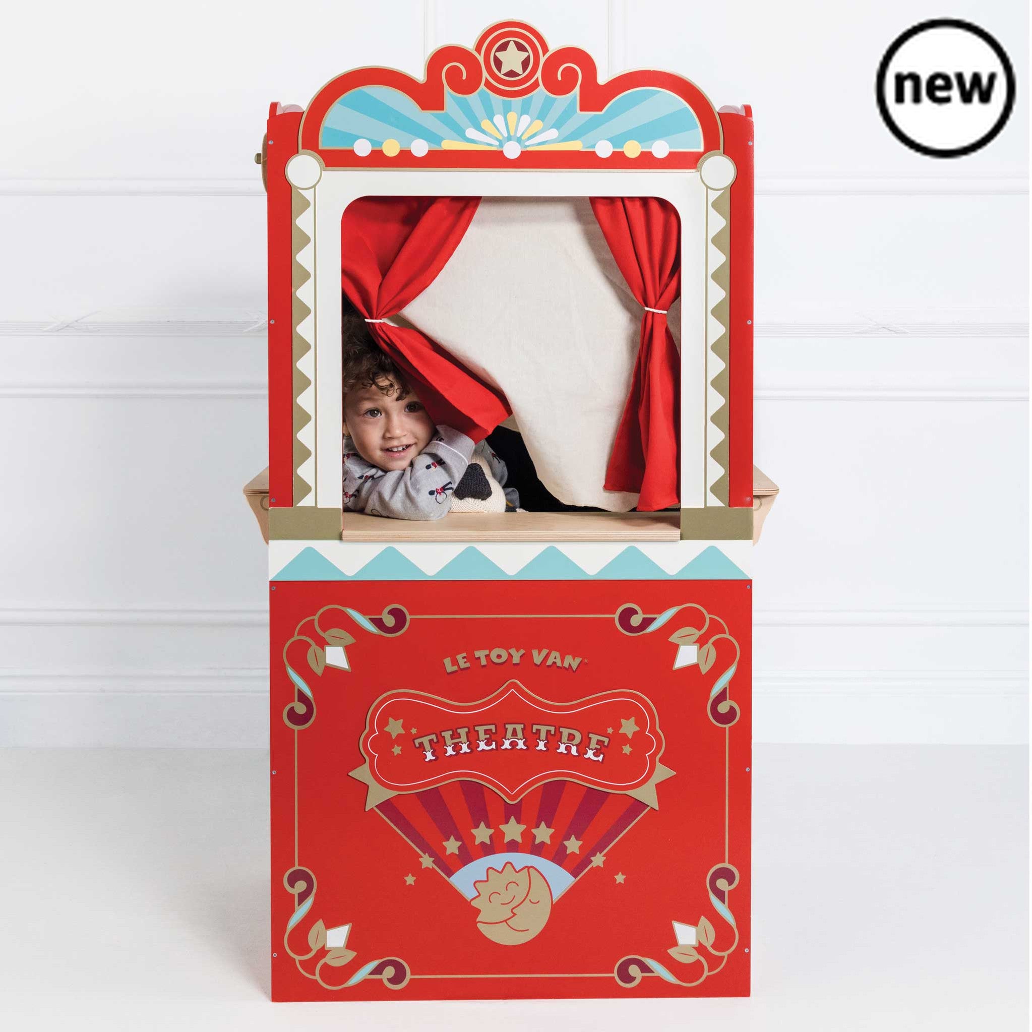 Showtime Puppet Theatre, Description The stage is set for roleplay fun! This amazing retro wooden puppet theatre toy is a real showstopper. With it's unique nostalgic design and brightly painted exterior, crafted from durable, sustainable wood. Little performers will adore this interactive toy, crammed with many realistic features to inspire imaginative learning. With a reversible sign, stage door and two chalk boards to display up and coming acts. For dramatic effect, we've included a pair of beautiful red