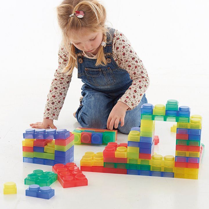 SiliShapes Soft Bricks Pk24, These perfectly sized SiliShapes Soft Bricks are made to fit a young child’s hand with ease and can be stacked, placed and arranged into patterns or sorted. The SiliShapes Soft Bricks interlock in a row or around a corner and provide young children with their first building brick set. The SiliShapes Soft Bricks are made from a special see-through silicon which is soft and flexible to the touch and safe to handle by children of any age. The SiliShapes Soft Bricks are ideal for us