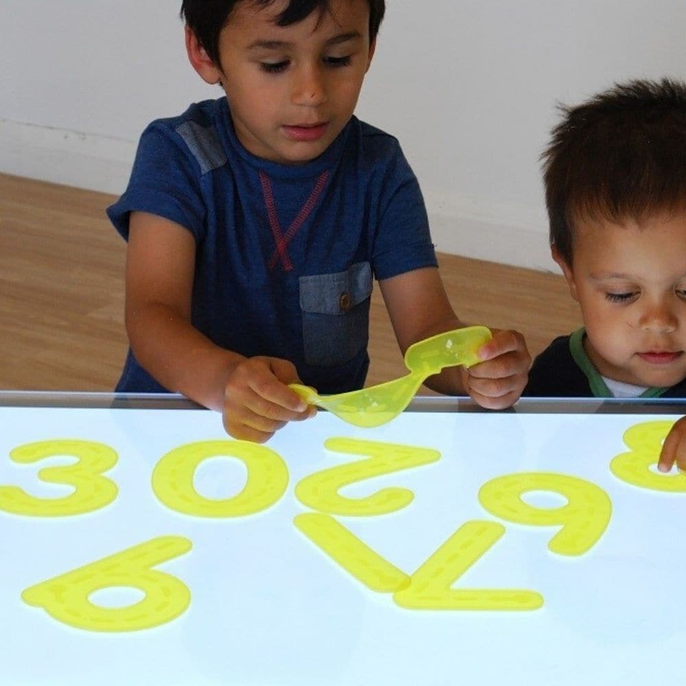 SiliShapes® Trace Numbers Yellow – Pk10, The Silishapes Trace Numbers Yellow offer a new concept for pre-schools, nurseries and primary schools are these packs of numbers made from silicon. The Silishapes Trace Numbers Yellow have the numbers 0-9 showing the dot starting point and trace arrows to help children to write the numbers correctly. Silicon is a very strong, stable and inherently safe material that can be used and then cleaned in a dishwasher without harm.The Silishapes Trace Numbers Yellow are sof