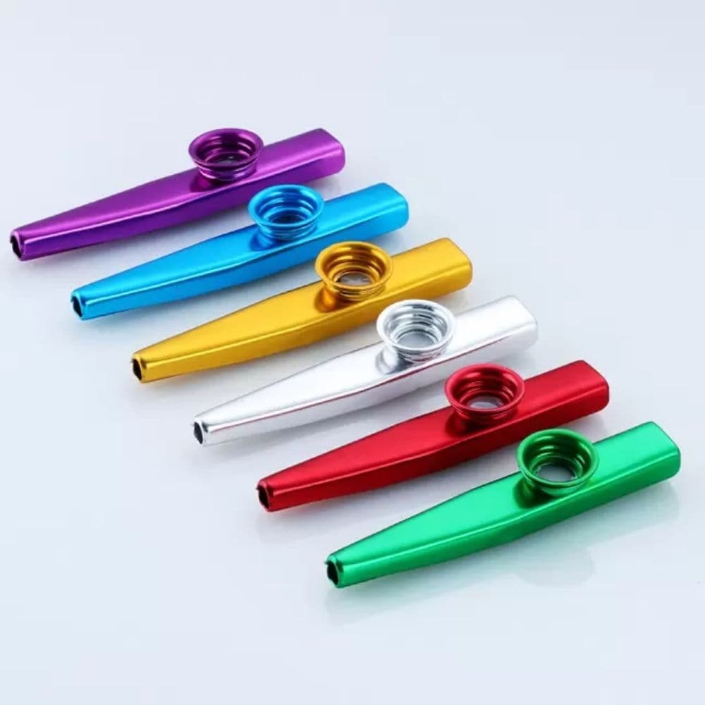 Single Percussion Metal kazoo, The Metal kazoo is a wind instrument which adds a "buzzing" timbral quality to a player's voice when the player vocalizes into it. This is a quality metal kazoo. It is loud and well made. It is similar to the kind used in various genres from Jazz to Blues and anyone covering Sgt Peppers! This is perfect for use in both professional and fun musical scenarios. Children love kazoos because they make funny noises which they love to keep repeating. Although as a parent you may thin