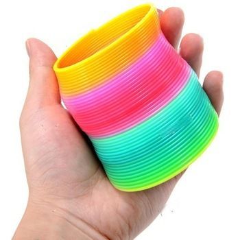 Slinky Spring, The Slinky Spring is a very popular tactile classic. This Rainbow Springy Slinky is just like the classic Slinky toy, only made from kid-friendly plastic instead! Plus, as the name suggests, it’s made with a beautiful array of colours. Stack up the Rainbow Springy at the top of the stairs, tip it over, and watch it walk down stairs! Play with the Slinky Spring between your hands or see what shapes it can stretch to! The Rainbow Springy Slinky is a fun and versatile tool that kids of all ages 