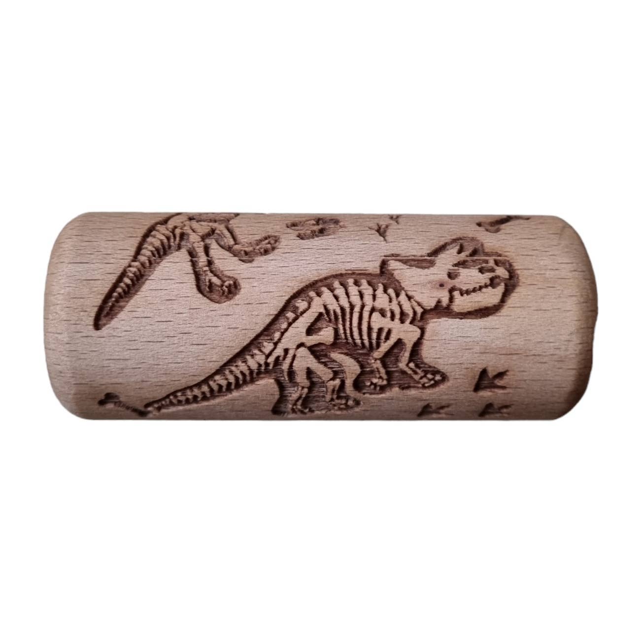 Small Dino Wooden Roller, Made of high-quality wood, this Small Dino Wooden Roller is sturdy and durable, ensuring endless hours of creative play for children of all ages. The embossed design creates texture that adds a unique touch to clay and playdough creations, making it a must-have tool for young artists and crafters.The Small Dino Wooden Roller is compact and easy to use, making it perfect for preschoolers and toddlers who are still developing their fine motor skills.So why wait? Add the Small Dino Wo