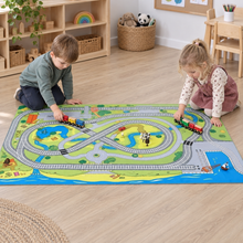 Children playing trains on Small World Railway Themed Play Mat