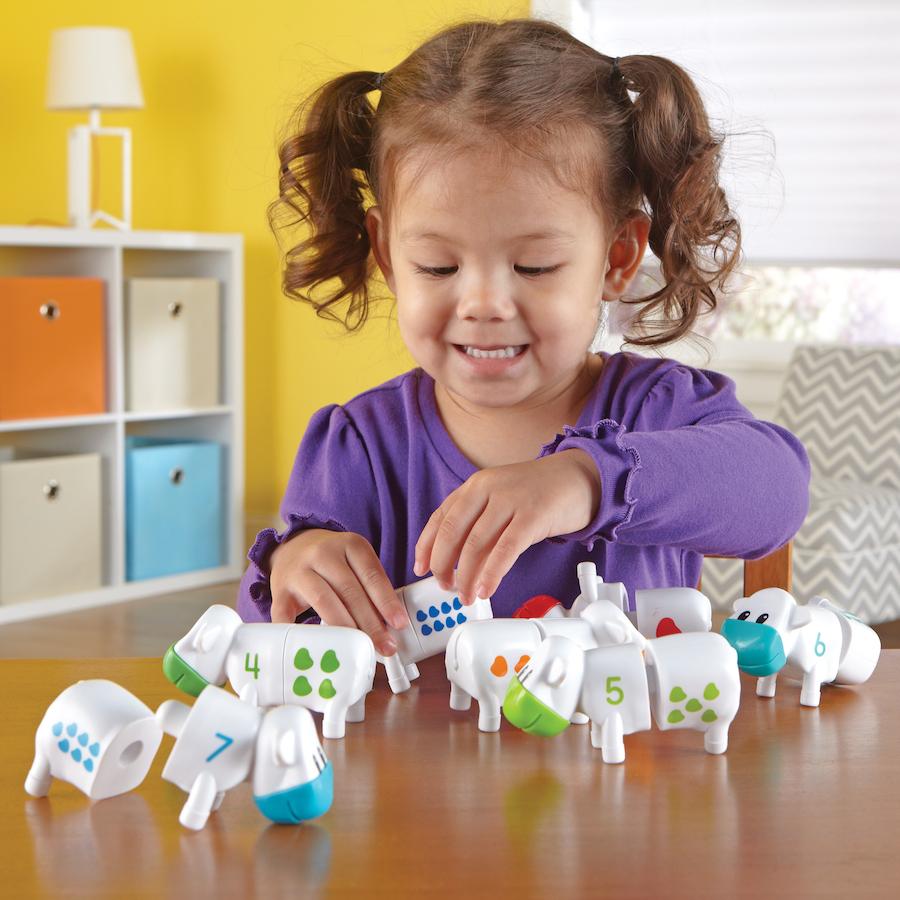 Snap-n-Learn Counting Cows, Explore numerals and amounts with these Snap-n-Learn Counting Cows Each Snap-n-Learn Counting Cow pulls apart for the children to snap together the corresponding shapes as well as matching the numeral on the head to the amount on the body. Encourage young children to master early learning skills in a snap with these colourful, two-piece plastic cows. Printed cows are easy for little hands to snap together and pull apart Activity set encourages a variety of early numeracy skills C