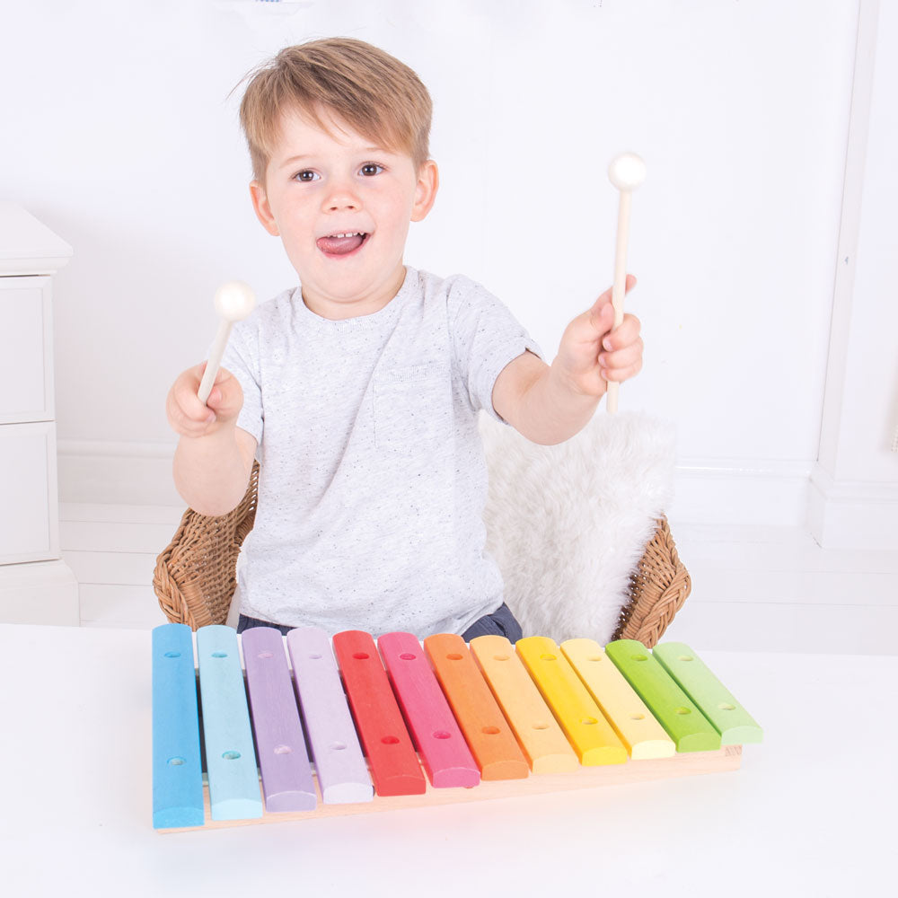 Snazzy Xylophone, This brightly coloured wooden Snazzy Xylophone is a highly educational way for creative toddlers to play music by ear. The Snazzy Xylophone comes supplied with wooden mallets that are ideally sized for little hands, and the multi-coloured bars help little ones to remember each note and which bar to strike in order to re-create it. The Snazzy Xylophone helps to develop dexterity and co-ordination. Our Snazzy Xylophone helps to develop dexterity and coordination. Snazzy Xylophone product fea