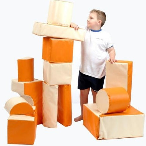 Soft Play Bag Orange and Cream, Our two tone soft play kits have been carefully designed to provide high contrast visual stimulus for both babies and the visually impaired. With their enormous capacity for imaginative projection in play, children can create role-play scenarios using the pieces in an infinite number of ways. The pieces are made of sturdy, hard wearing materials so they can withstand frequent use and extensive play. They are easily wiped clean and come with a handy mesh storage bag. Soft Play