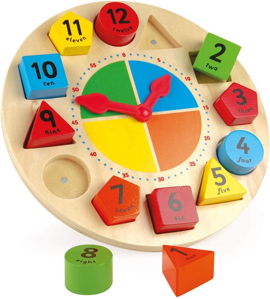 Sorting and Teaching Clock, The Sorting and Teaching Clock is a wonderful wooden play clock which works on many levels. First of all, it will encourage colour and shape recognition, then it will help with number learning and ultimately it will be a fantastic aid for teaching the time. Each wooden shape is painted with a numeral with the number spelled out in letters below. The blocks come in a variety of shapes – squares, circles, triangles and pentagons – which children will learn with pleasure. The centre