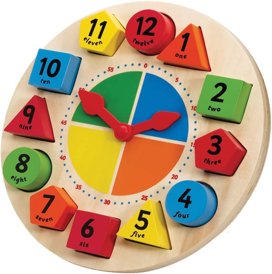 Sorting and Teaching Clock, The Sorting and Teaching Clock is a wonderful wooden play clock which works on many levels. First of all, it will encourage colour and shape recognition, then it will help with number learning and ultimately it will be a fantastic aid for teaching the time. Each wooden shape is painted with a numeral with the number spelled out in letters below. The blocks come in a variety of shapes – squares, circles, triangles and pentagons – which children will learn with pleasure. The centre