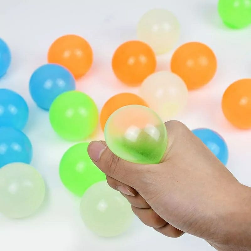 Splatballz Sticky Ball 6 Pack, A sticky toy that's fun and unique, without the mess! These Squish-ick Ballz stick to walls, glass, and most surfaces easily. You can stretch them, bounce them on the floor or a hard surface, toss them around, or throw them to stick on a ceiling. Then catch them before they hit the ground and toss them back up again! Arriving in a pack of 6, these silly sticky balls can also serve as a terrific sensory toy for both adults and children ages 4 and up. They're especially effectiv