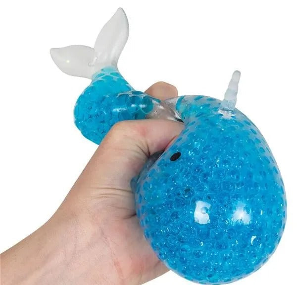 Squeezy Bead Narwhal, Discover the enchanting world of the Squeezy Bead Narwhal! This delightful toy is not just your ordinary narwhal - it's filled with squishy jelly beads that offer an extraordinary tactile experience. Get ready to immerse your senses in a realm of squishy, stretchy, and squeezable fun!Designed to provide ultimate satisfaction, the Squeezy Bead Narwhal is perfect for those seeking stress relief or a pleasant fidget toy. As you apply pressure and manipulate its soft and pliable body, feel