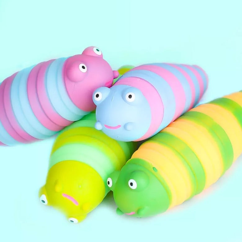 Squidgy Worm, Introducing the Super Squeezy and Stretchy Squidgy Worm! This one-of-a-kind squeezy toy is not only incredibly fun to play with but also serves as an amazing stress reliever. With its squidgy and stretchy texture, this toy provides the perfect sensory experience to help channel those restless fingers and relieve stress.Designed with a calming worm theme, the Squidgy Worm stress toy is the ultimate tool for focusing minds and creating a serene state of mind. Whether you're feeling overwhelmed w