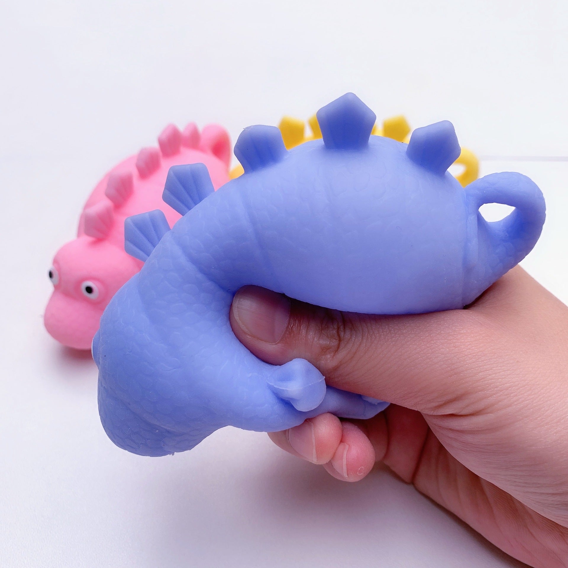 Squishy Dinosaur Toy, Introduce your senses to the delightful Squishy Dinosaur Toy—a multisensory experience that combines tactile pleasure, visual stimulation, and stress-relief, offering a wealth of benefits for users of all ages. 🦕 Squishy Dinosaur Toy Features: Squishy & Squeezy: Easy to squeeze, providing a satisfying sensory experience and stress relief. Tentacle Texture: Soft and tactile tentacles across its body make it pleasant to stroke and touch, enhancing tactile engagement. Light Up Feature: Eq