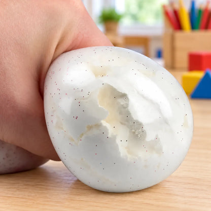 Squishy Snow Ball being squeezed