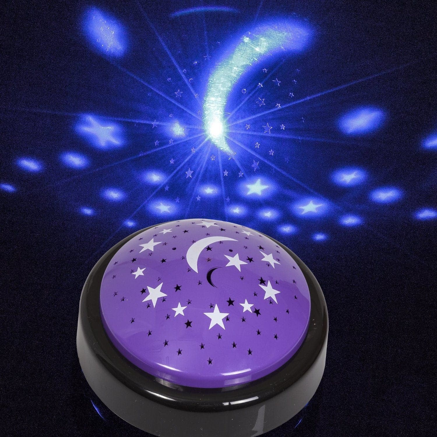 Star Light Projector Table Top, Illuminate your nights with the enchanting Star Light Projector Table Top! This charming device casts a sky full of stars and a radiant crescent moon on your ceiling, transforming any room into a serene celestial escape. 🌌 How It Works: The top of this projector is adorned with specially crafted holes positioned over a light source, allowing light to pierce through the gaps and project a constellation of stars and a moon above, creating an instant celestial ambiance. 🌟 Design