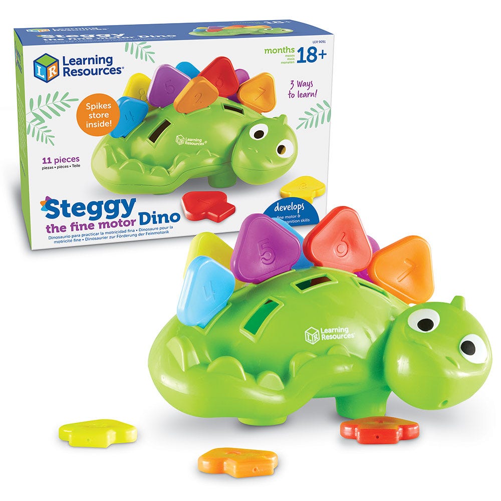 Steggy the Fine Motor Dino, Steggy the Fine Motor Dino helps little learners develop fine motor skills. Inserting the brightly coloured numbered spikes into Steggy’s back helps build hand strength, refine the pincer grasp, and improves hand-eye coordination. Plus, young children also learn about colours and numbers. Spikes store inside when not in use for quick and easy tidy-up. There’s a spiky situation that needs hands-on help – develop fine motor skills while inserting the numbered spikes into Steggy’s b