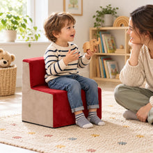 Suede Toddler Chair in use by a child during reading and play in an early years setting, lifestyle view 1