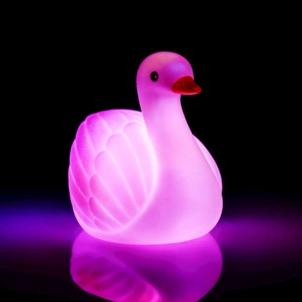 Swan Bath Light, Introducing our enchanting Light Up Swan Bath Toy! A delightful companion for your little one's bath time adventure, this water-activated swan bath light will transform the tub into a mesmerizing oasis. Watch as the swan elegantly bobs and floats, casting a radiant glow and flashing captivating colors as it explores its aquatic playground. Designed with a touch of whimsy and magic, this adorable swan bath light is more than just a bath toy - it's a captivating sensory experience! As soon as