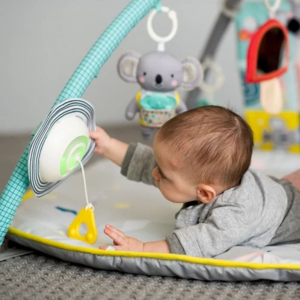 Taf Toys All Around Me Gym, New from Taf Toys, this 4 in 1 floor gym is the perfect aid to encourage your little one to practice a variety of body positions from day one. This proactive positioning is hugely valuable for your baby’s motor, cognitive, sensory and learning development, as well as stimulating your baby’s head turning development. This Baby gym’s enticing lights and calming music provide a charming experience for both baby and parent, while your child plays with the many multi-sensory hanging t