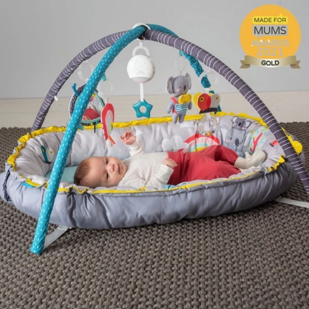 Taf Toys Koala Musical Cosy Gym, Introduce your little one to a world of sensory delights with Taf Toys’ Koala Musical Cosy Gym. This multifaceted play gym is not only incredibly plush and comfortable but is also engineered to aid in your baby’s physical and cognitive development. Here’s why this Cosy Gym is a must-have for new parents: Taf Toys Koala Musical Cosy Gym Features and Benefits: Versatile Design Specially designed to accommodate babies of all sizes, this gym has the unique capability to draw up 