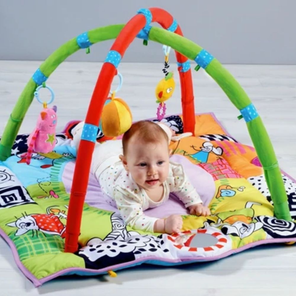 Taf Toys Newborn Baby Gym, Treat your newborn baby to this extra cosy, thickly padded baby play gym! The Taf Toys Newborn Baby Gym has been specially designed to aid new-born development. This large 90 x 90cm baby gym has a luxurious, super soft centre, providing a cosy, comfortable place for even the newest of babies. The sides of the mat can be raised to create a snug environment, revealing high contrast illustrations in a baby-book style, designed to help baby's visual development in the early stages, al