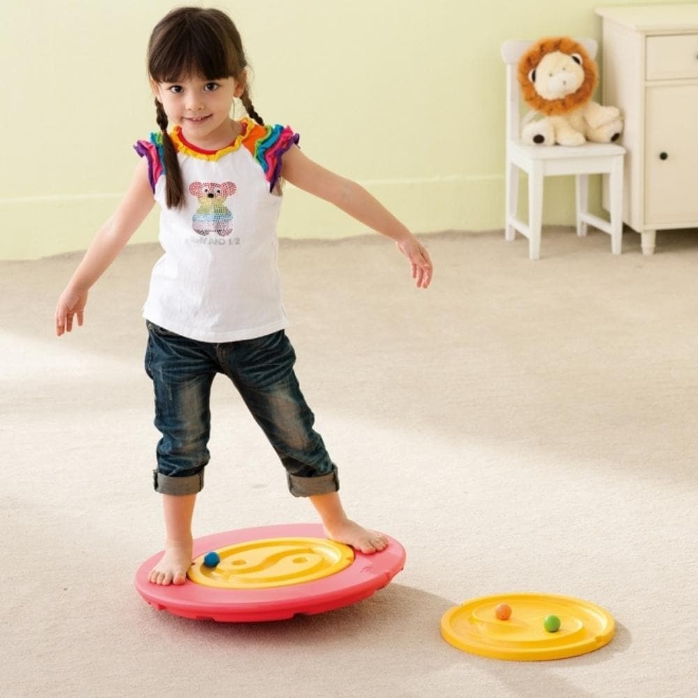 Tai chi balance board, Introducing the Tai-Chi Balance Board - not just your ordinary balance board but a holistic approach to nurturing your child's core skills! Features: Dynamic Movement Control: With its unique design, a child can stand atop the Tai-Chi Balance Board and make the ball roll through the intricately patterned orbit. By simply shifting their weight and moving their body back and forth, they can navigate the ball with precision, building balance and coordination with every twist and turn. In