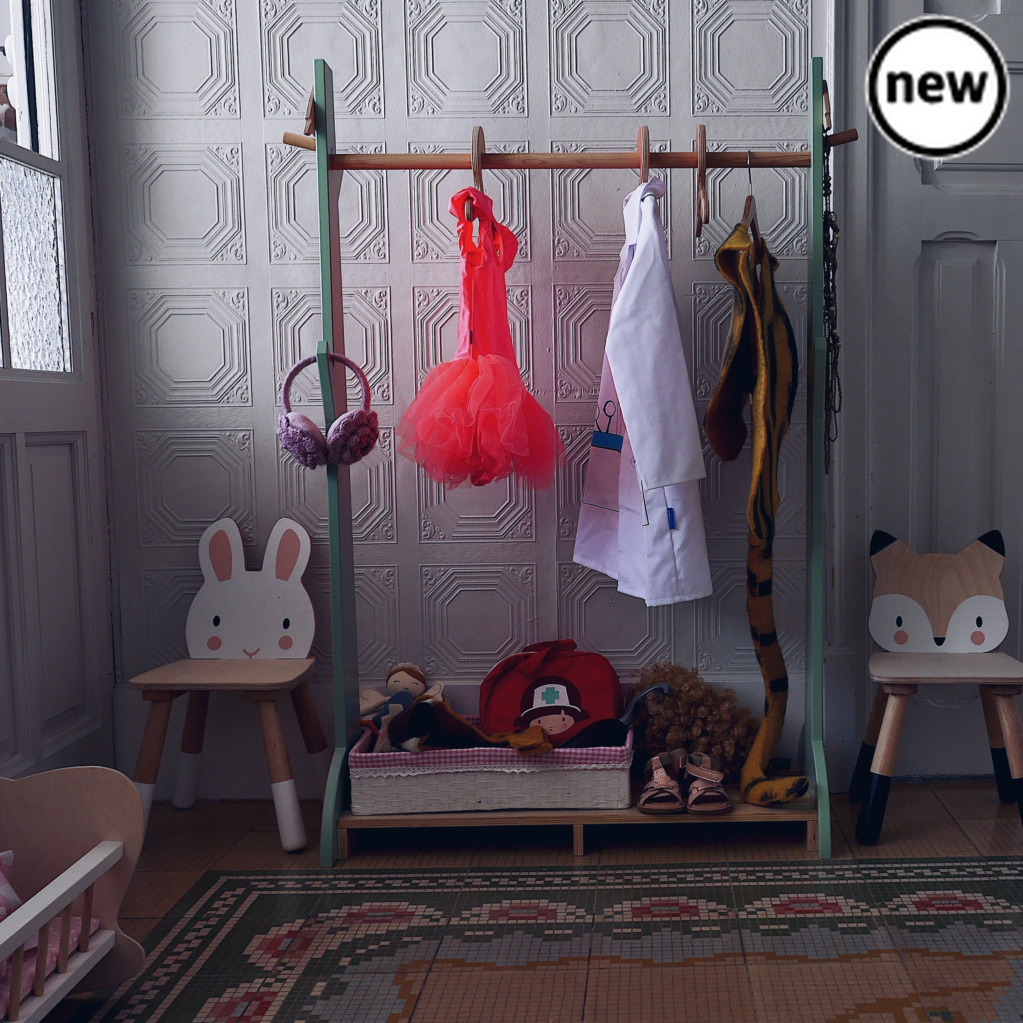 Tenderleaf Toys Wooden Forest Clothes Rail, Introducing the Tenderleaf Toys Wooden Forest Clothes Rail, a delightful addition to any child's bedroom or playroom. Designed and made with utmost care by Tenderleaf Toys, this clothes rail combines functionality with a charming woodland-inspired aesthetic.With its fresh and clean design, this clothes rail is the perfect height for little ones to independently hang up their clothes or store their shoes and bags on the base. Encourage your child to develop their o