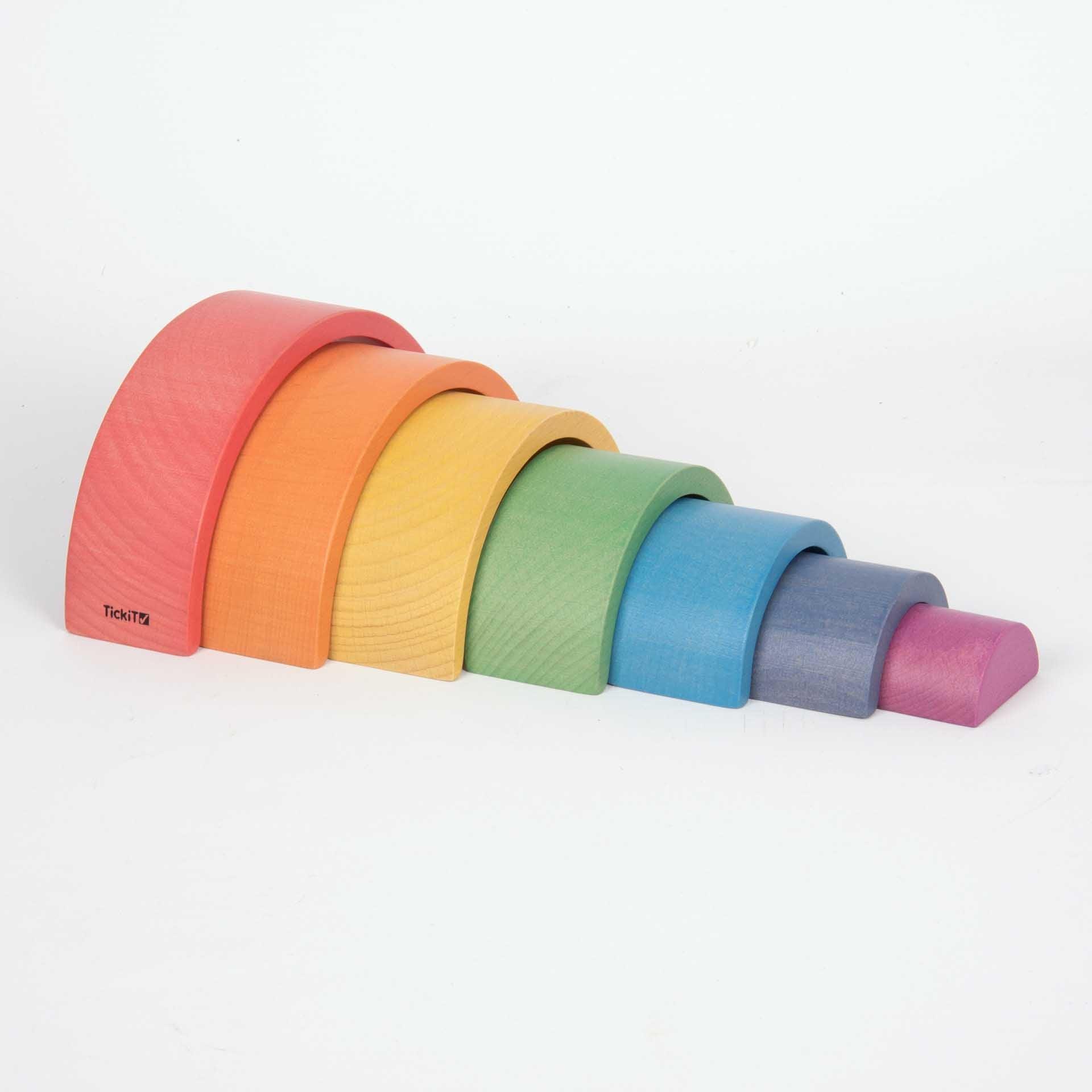 TickIt Rainbow Architect Arches, Our Rainbow Architect Arches are made from beautiful smooth solid beechwood with a natural woodgrain finish in the seven different colours of the rainbow. The TickIt Rainbow Architect Arches nest together as a set with the inner block being a solid 3D semicircle. This shape set will allow your child to unlock their creativity and innovation.Learning through play, the nesting set can be used to compliment the design and construct of towers, sculptures or create homes for smal