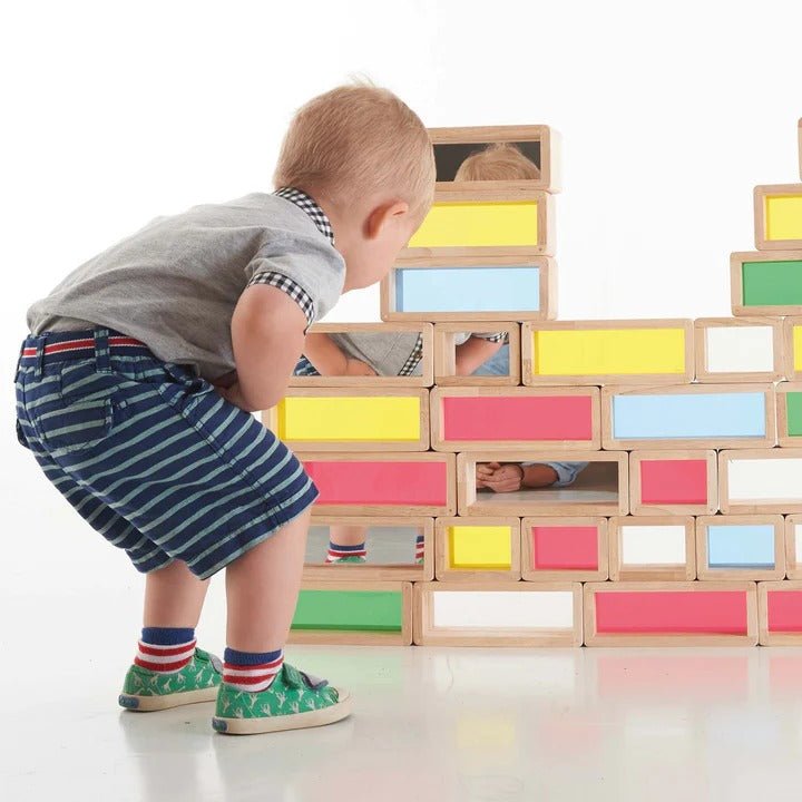 TickiT Rainbow Bricks, TickiT® Rainbow Bricks are giant rubberwood bricks with a beautiful colourful acrylic centres. The transparency of the TickiT Rainbow Bricks allows light to pass through and create a visually stunning effect to captivate your child's imagination. The TickiT Rainbow Bricks can be stacked to create a rainbow wall or half sized bricks can help your child to build an interesting structure. Colourful and tactile, children will love using them to build, see the world in different colours, f