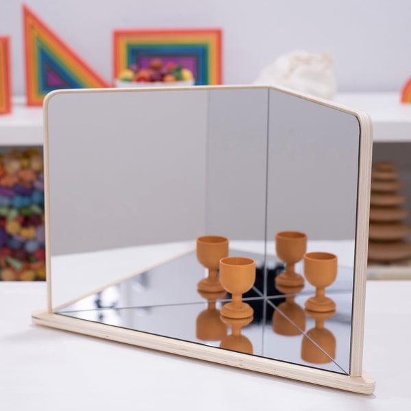 TickiT Wooden 4-Way Mirror, The TickiT® Wooden 4-Way Mirror is an exciting funhouse of plane mirrors designed for your child to experiment with reflection. With a beautiful birch plywood 90-degree corner design supporting a backdrop, sides and base of clear mirrored acrylic, objects are reflected backwards and forwards to infinity!Your child will enjoy using the TickiT Wooden 4-Way Mirror in an imaginative play, small world play or for examining objects more closely from different angles.The TickiT Wooden 4