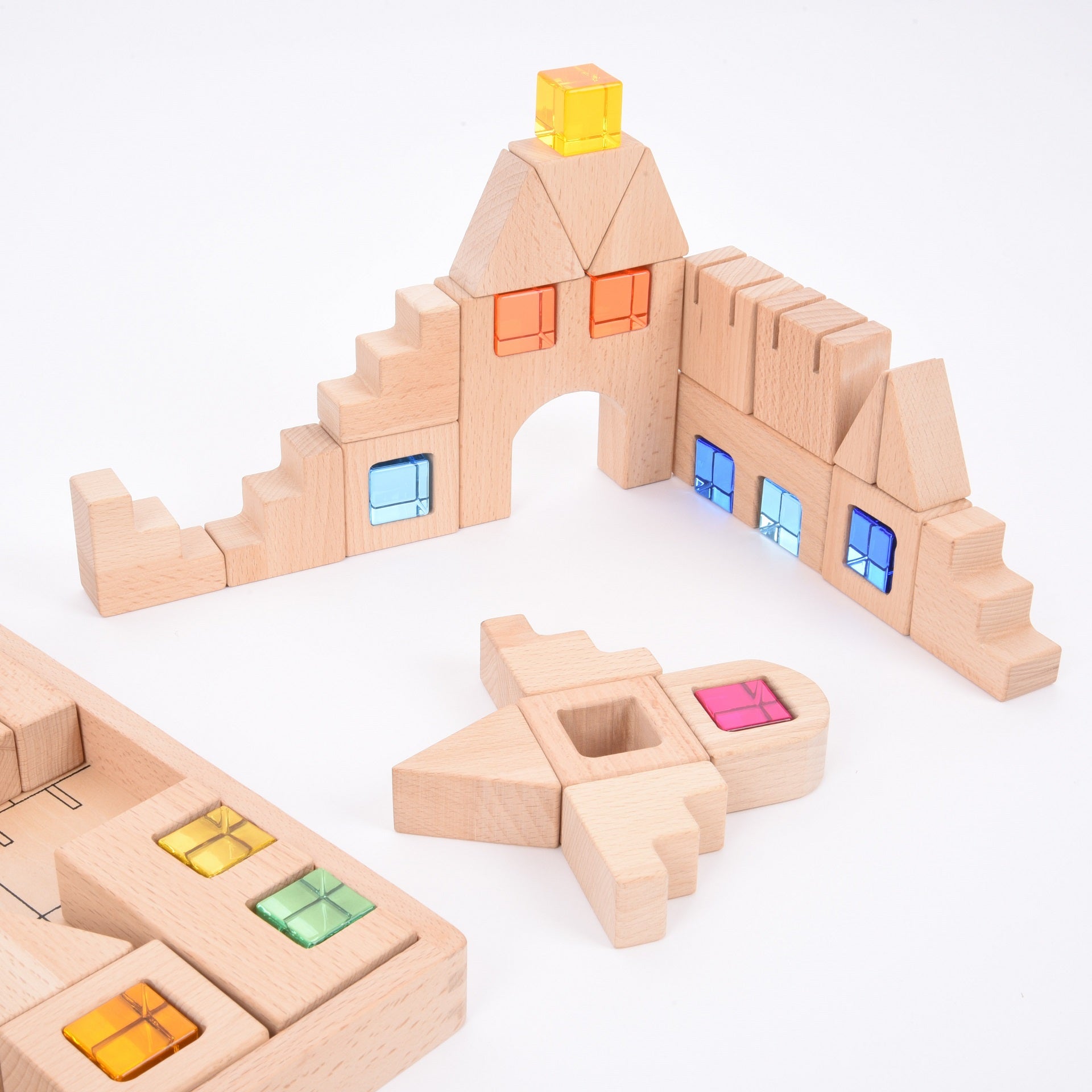 TickiT Wooden Building Gem Blocks, Creatively designed, our TickiT® Wooden Building Gem Blocks will encourage your child to use their limitless imagination, construct exciting structures, and learn through play! The smooth natural wooden blocks with crystal gem cube inserts give bursts of captivating colour, sparking your child's curiosity. The blocks are tactile and offer an open-ended approach for your child to have the freedom to use them however they choose. Older children can use their advanced creativ
