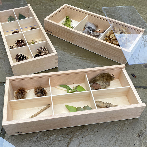 TickiT® Wooden Discovery Boxes, What better way to sort and organise treasured little objects than with our TickiT Wooden Discovery Boxes. The TickiT Wooden Discovery Boxes are a set of beautiful and sturdy beechwood boxes with 3, 6 and 8 storage compartments and clear acrylic sliding lids. A compact and tidy storage solution that enables your child to arrange and display objects by colour or shape. The TickiT Wooden Discovery Boxes are perfect for using with natural resources or why not combine with our Ra