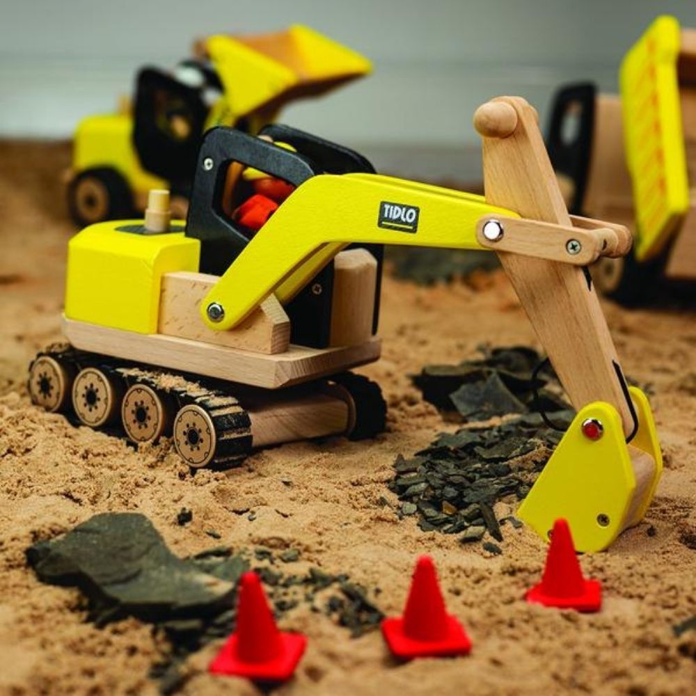 Tidlo Digger, The Tidlo Digger is a Strong painted wooden construction toy with realistic detailing . The Tidlo Digger has a 360 degree swivelling cab, fully functioning and poseable scoop that raises and lowers, finished with sturdy caterpillar tracks to cope with all terrain! The Tidlo Digger is an ideal individual toy but add to your collection and create an entire fun building site for hours of imaginative play. Make light work of any pretend groundworks with the Tidlo Digger Toy. This durable and detai