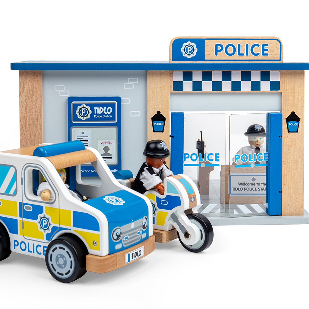 Tidlo Police Toy Bundle, “You’re under arrest!” Get those baddies behind bars with our exclusive Tidlo Police Toy Bundle. Aspiring young police officers can indulge in hours of pretend play with the included Police Station, Police Car, Police Van, and Police Officers & Prisoner figures. Made from high-quality, responsibly sourced materials, each police toy in this small world play set is designed for little hands to play with. Police toys are a great way to encourage creative and imaginative play sessions a