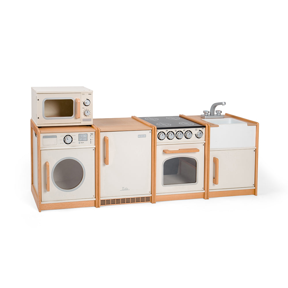 Tidlo White Play Kitchen Bundle, Domestic little ones can be just like the grown-ups in their homes with our exclusive Tidlo White Play Kitchen Bundle. Enjoy hours of pretend play with the included Sink, Cooker, Washing Machine, Fridge and Microwave. Made from high-quality, responsibly sourced materials, each pretend play toy in this play kitchen set is designed for little hands to play with. Play kitchens are a great way to encourage creative and imaginative play sessions as kids re-enact real-life domesti