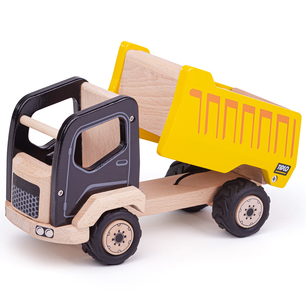 Tipper Truck, All that pretend dirt has to go somewhere! This durable, detailed wooden Tipper Truck Toy can take loads from the digger and loader, and empty the contents easily using the handle on the working tipper bed. This tipper truck features a moving tailgate and its large, chunky rubber tyres are ideal to grip smooth surfaces and its rounded, easy to hold shape is perfect for little hands. An open top cab design allows for little workers to fit in easily. Develops hand/eye coordination and fine motor