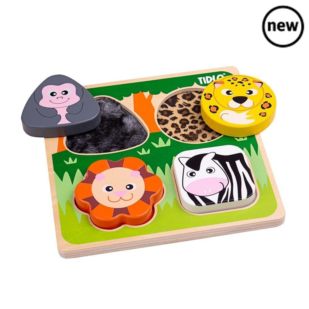 Touch and Feel Safari, Feel the hairy gorilla and the furry lion... These are just two of the exciting textures to explore on this delightful Touch and Feel Safari Puzzle. The safari animals that are illustrated in this colourful jungle scene are a gorilla, lion, leopard and zebra. The Tidlo Touch and Feel Puzzles are a diverse range of sensory puzzle boards great for early development. Remove the four wooden puzzle pieces to reveal different, appropriately textured materials underneath the animals. A great
