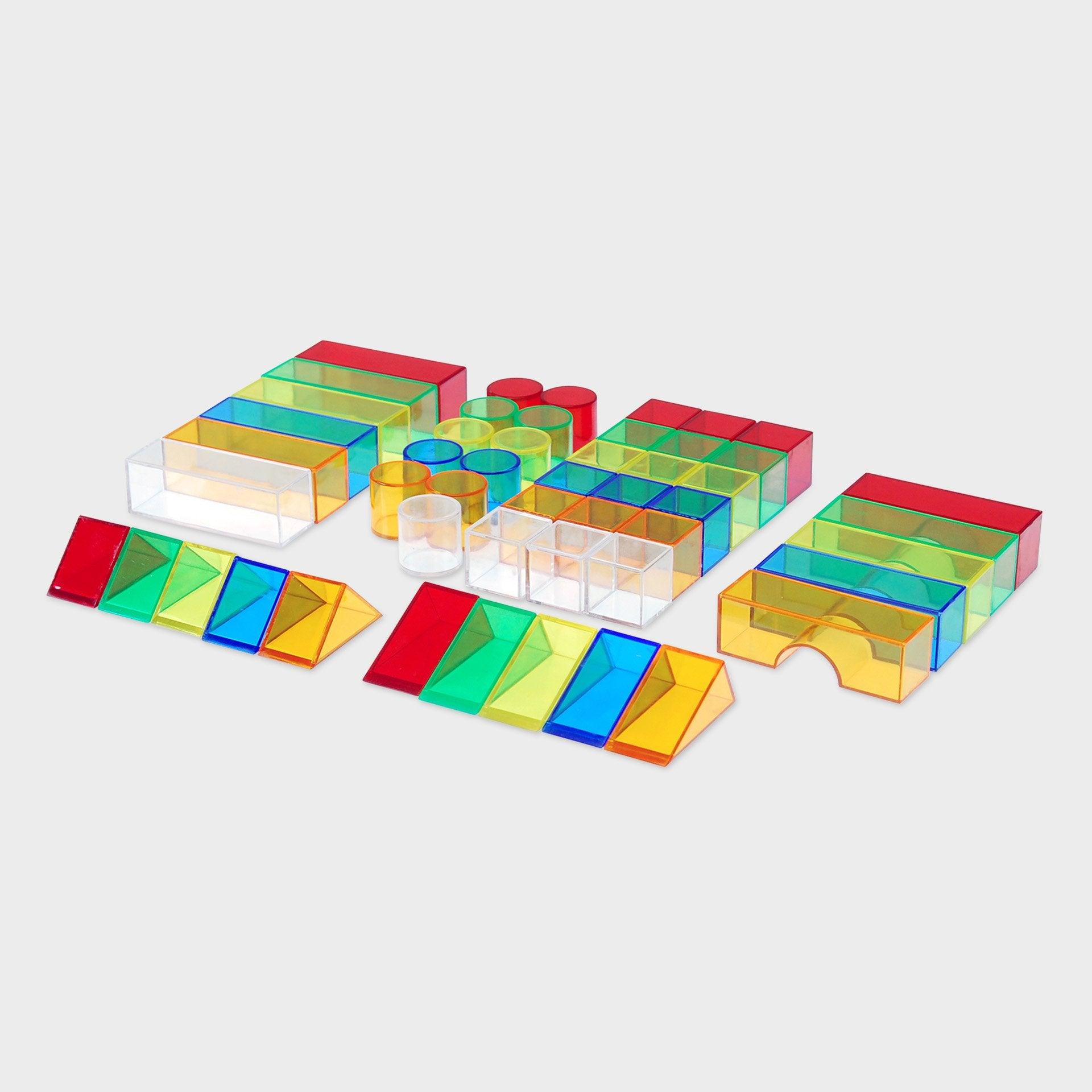 Translucent Colour Blocks, TickiT® Translucent Colour Blocks is a set of colour acrylic 3D building blocks in six shapes, perfect for use on a light panel where towers and structures look even more impressive with the light shining through the colourful buildings! The Translucent Colour Blocks are ideal for developing fine motor skills through construction and encouraging imaginative play. The Translucent Colour Blocks set includes circular and rectangular pillars, triangular prisms, cubes and bridges. The 